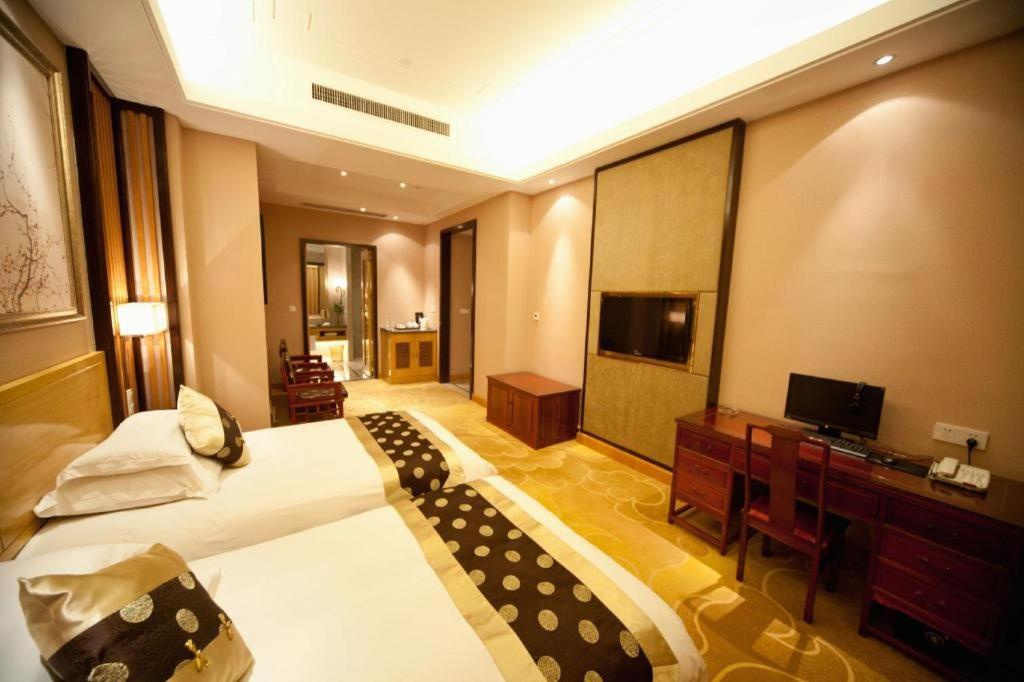 Feicheng Blossom Hotel Exterior photo