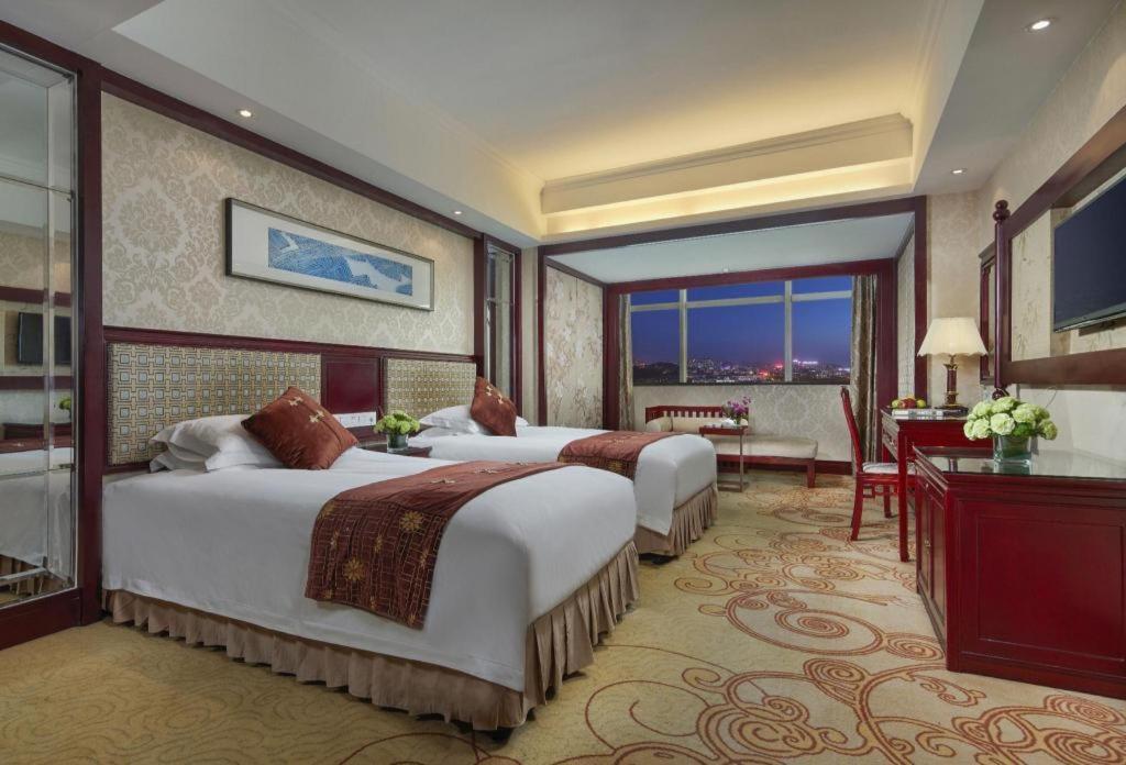 Feicheng Blossom Hotel Exterior photo