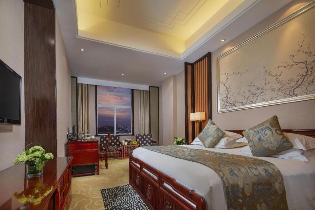 Feicheng Blossom Hotel Exterior photo